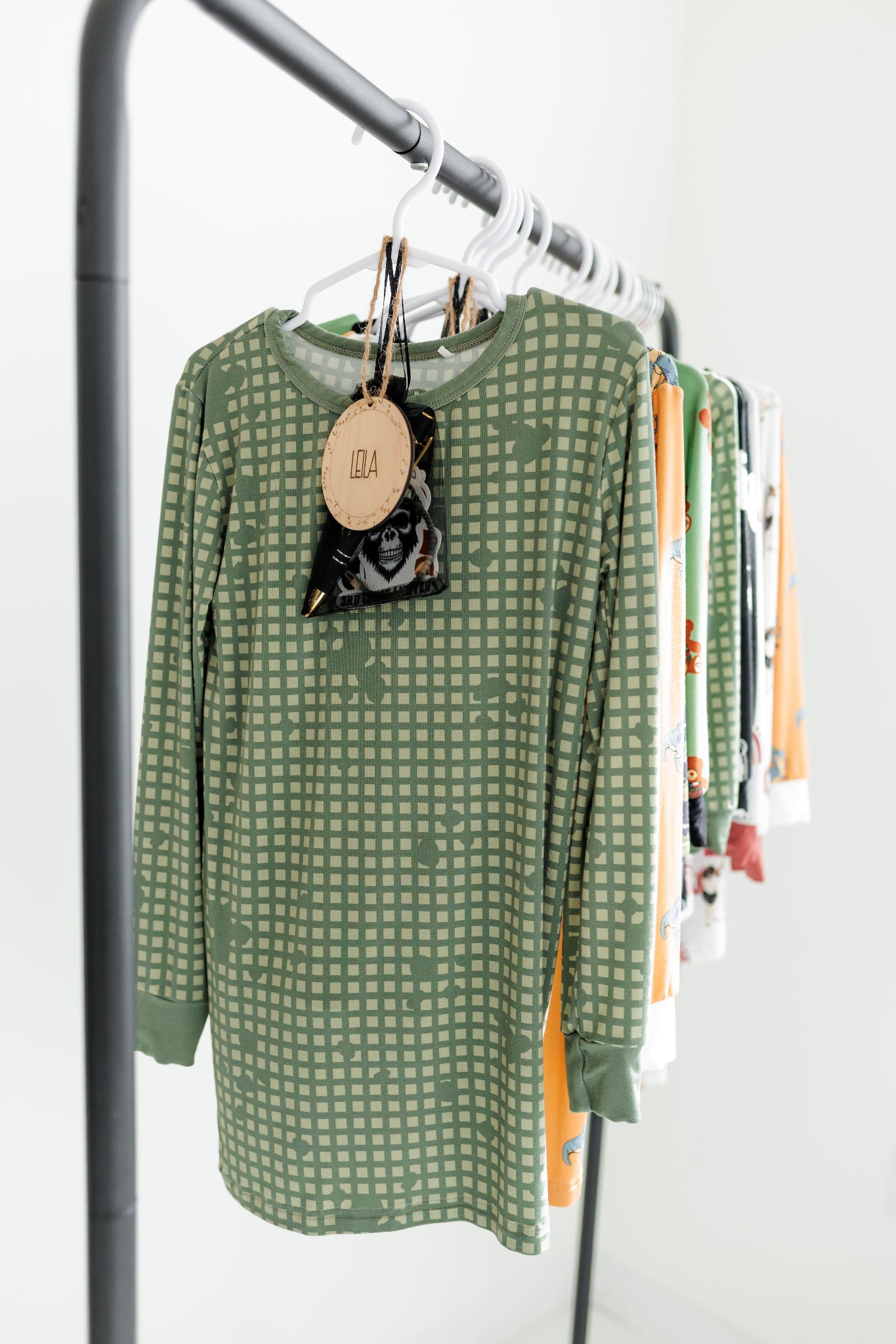 all tactical jammies hanging on a rack