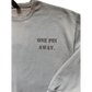 Gray sweatshirt with 'ONE PIN AWAY.' text on a white background