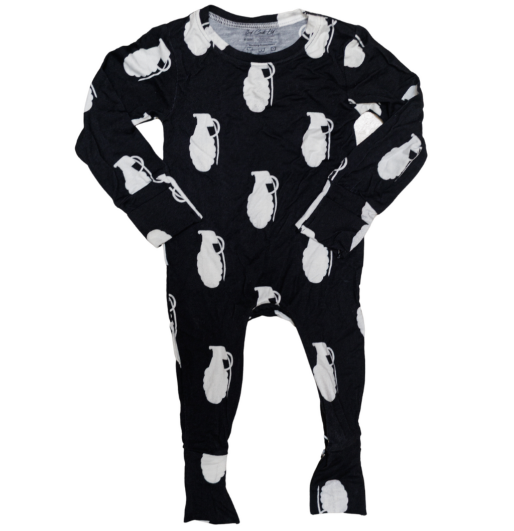 Black onesie with white animal print on a white background