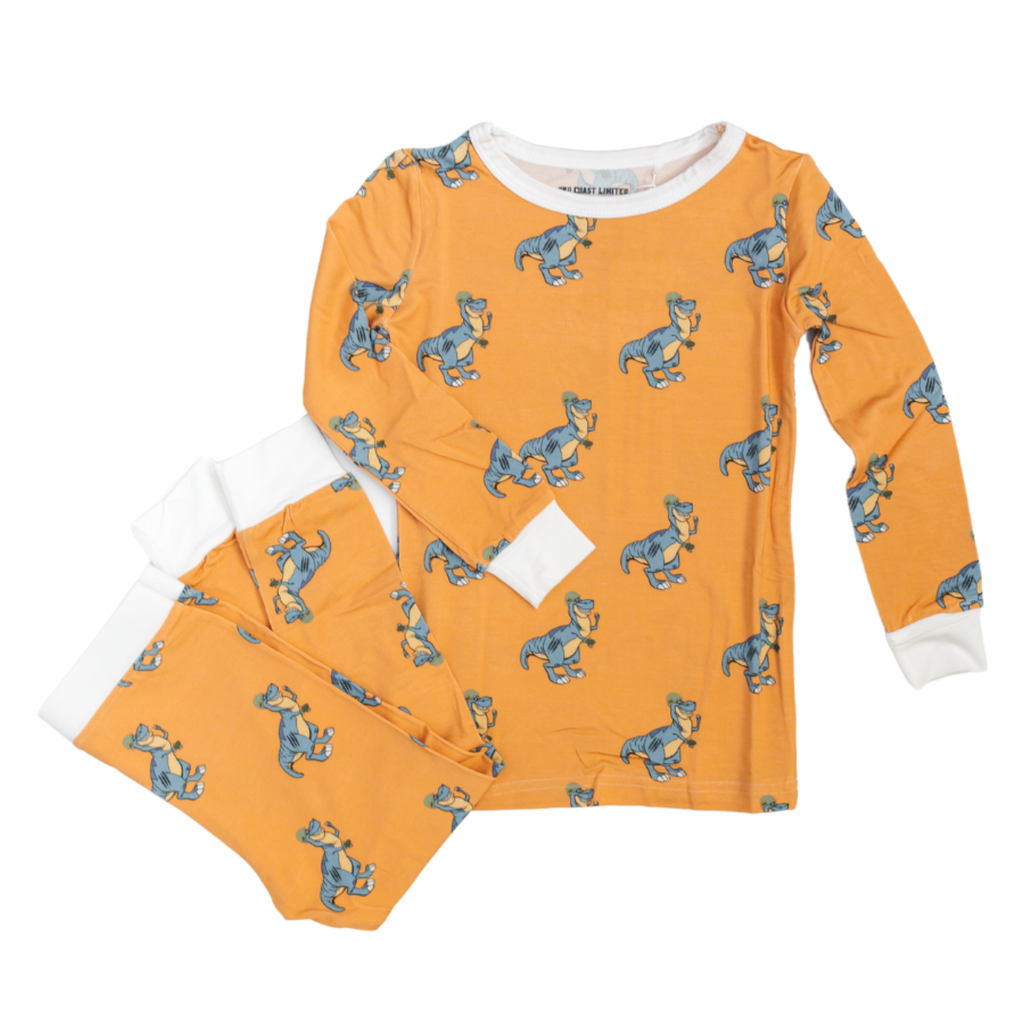 Children's pajama set with orange pattern on a white background