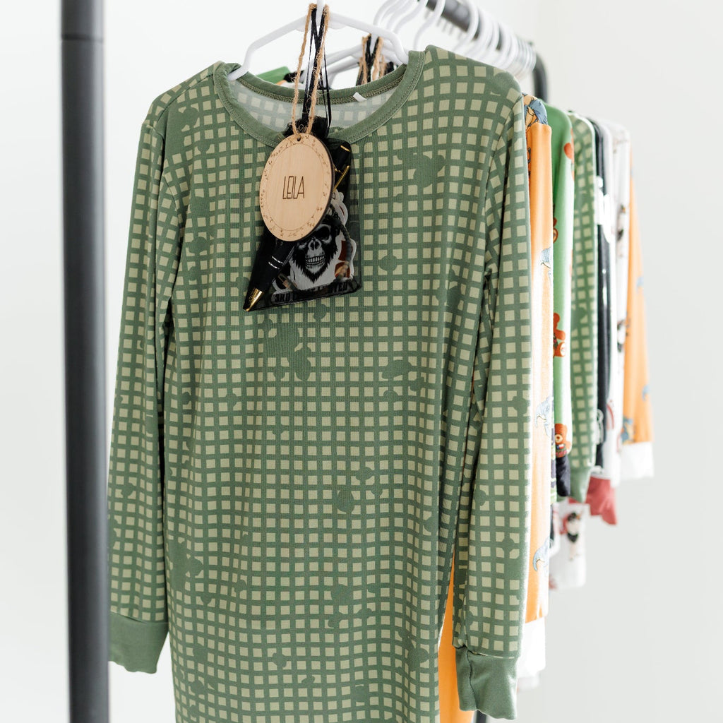 all tactical jammies hanging on a rack