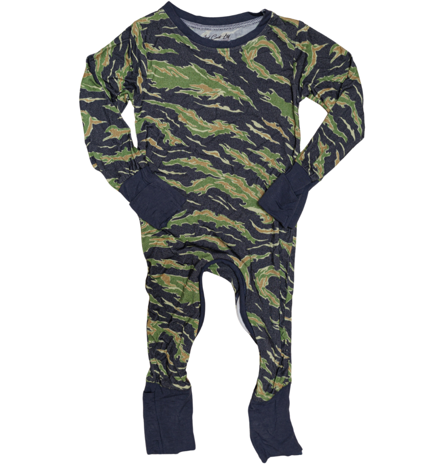 Camouflage-patterned onesie with navy accents on a white background